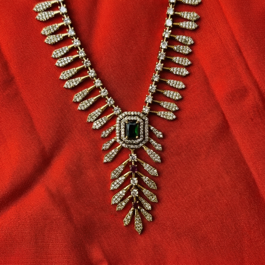 Elegant diamond necklace on a red fabric background
