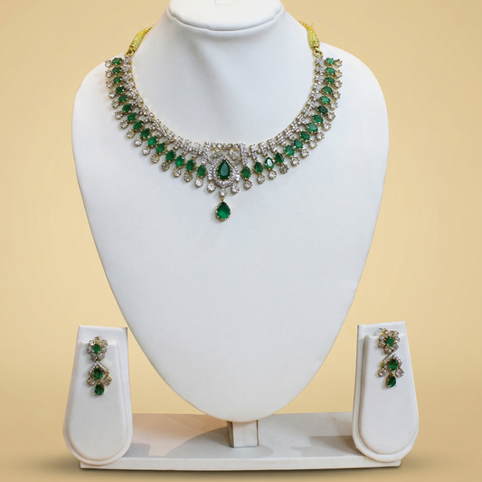 Jewelry set with necklace and earrings on a mannequin bust against a beige background