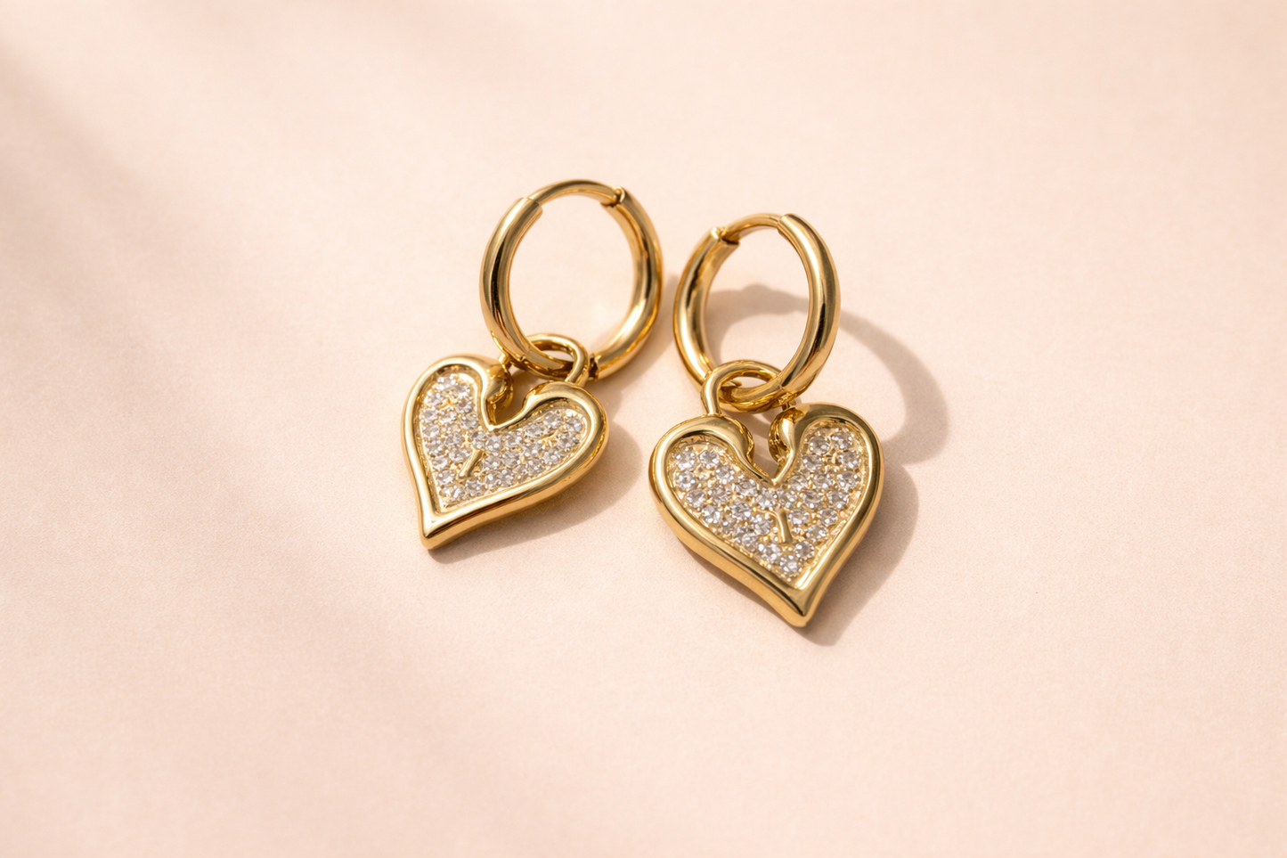 Gold heart-shaped earrings