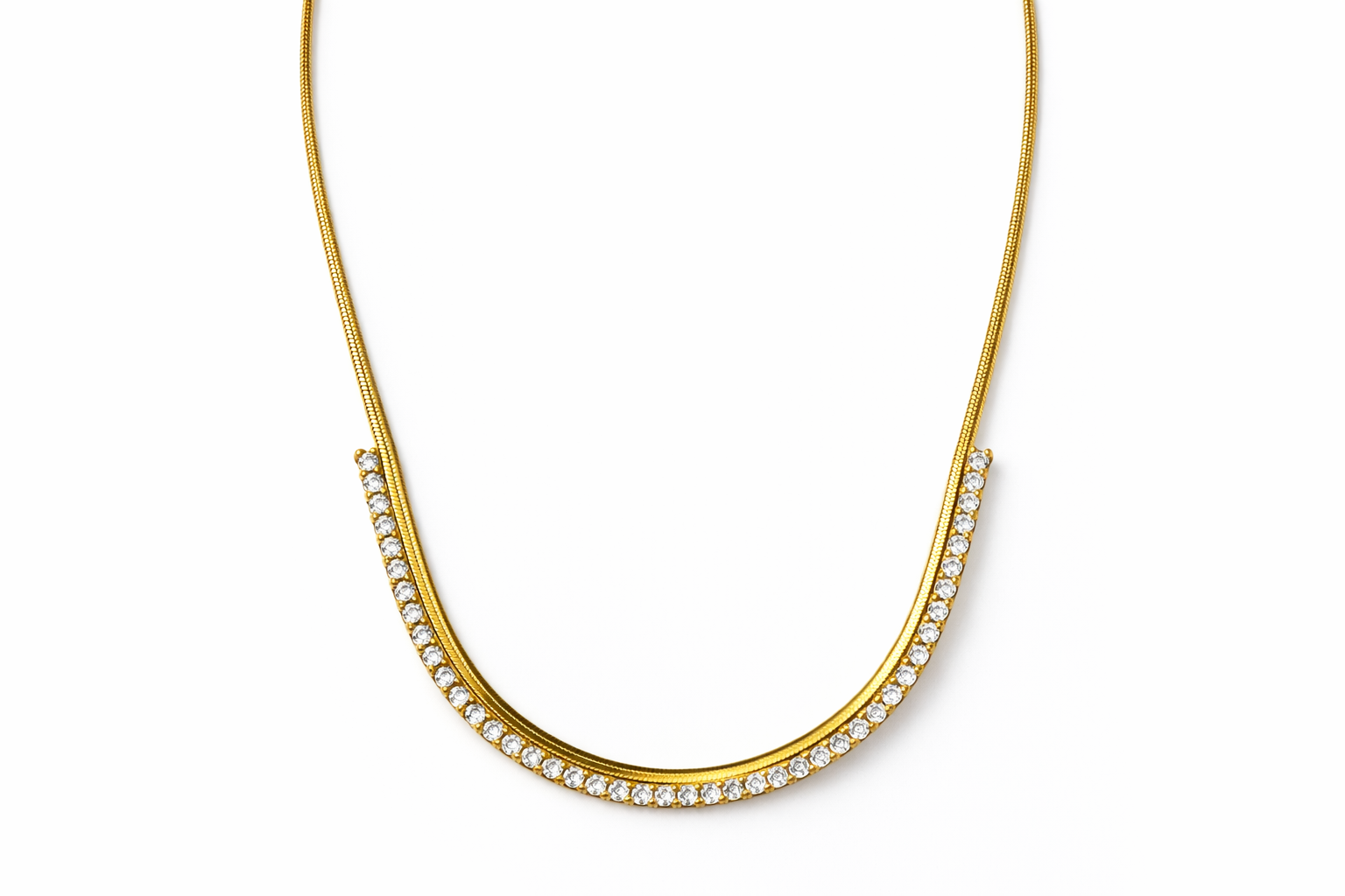 Gold necklace with embedded stones on a white background