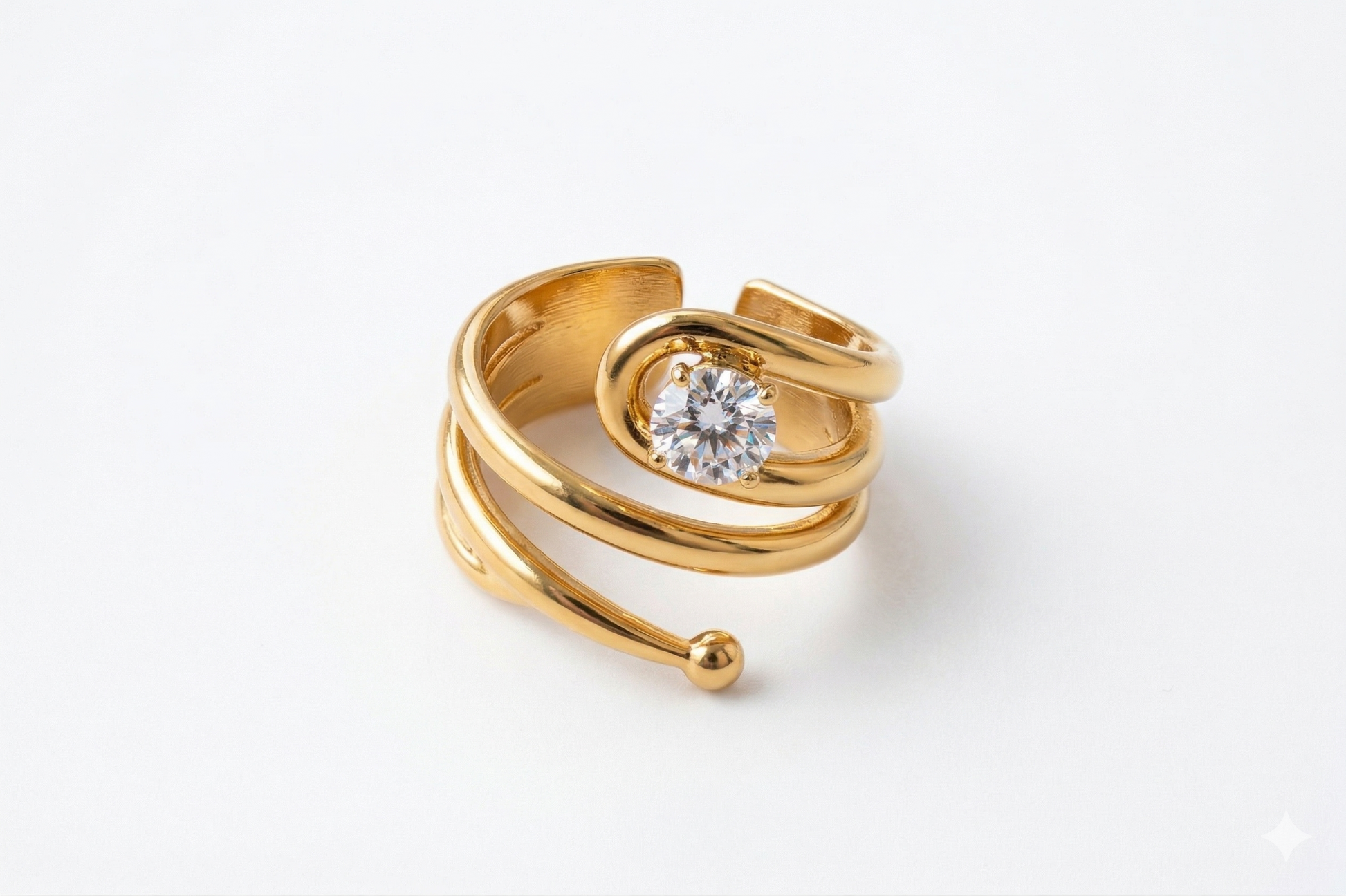 Gold ring with a diamond on a white background