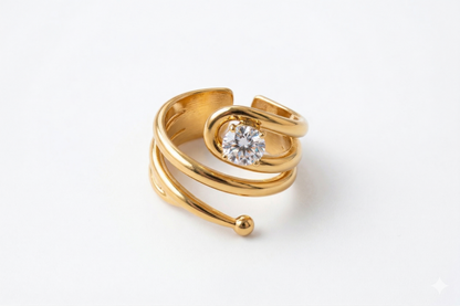 Gold ring with a diamond on a white background