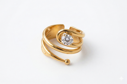Gold ring with a diamond on a white background