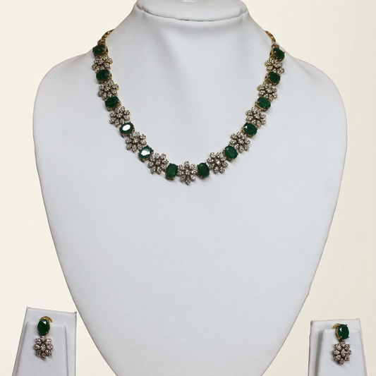 Jewelry set with necklace and earrings on a white mannequin bust