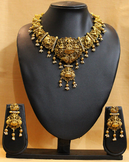 Gold necklace and earrings set