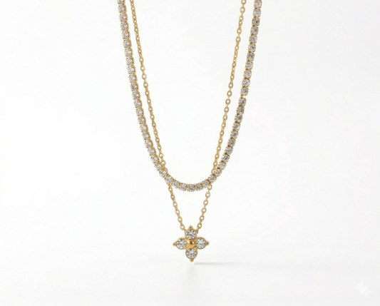 Two gold necklaces with diamond pendants on a white background